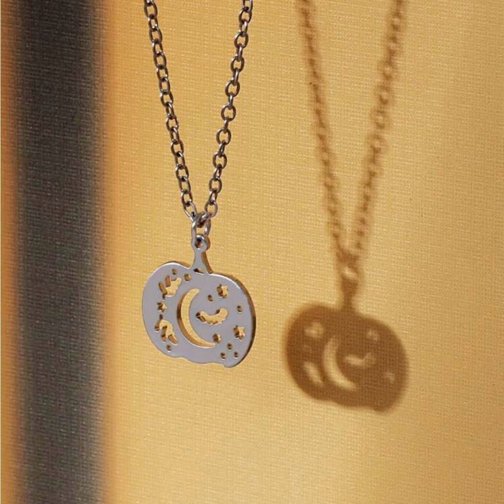 Minimalist Goth Pumpkin Necklace with cut out Bat, Crescent Moon Fall Leaves - Picture 2 of 3